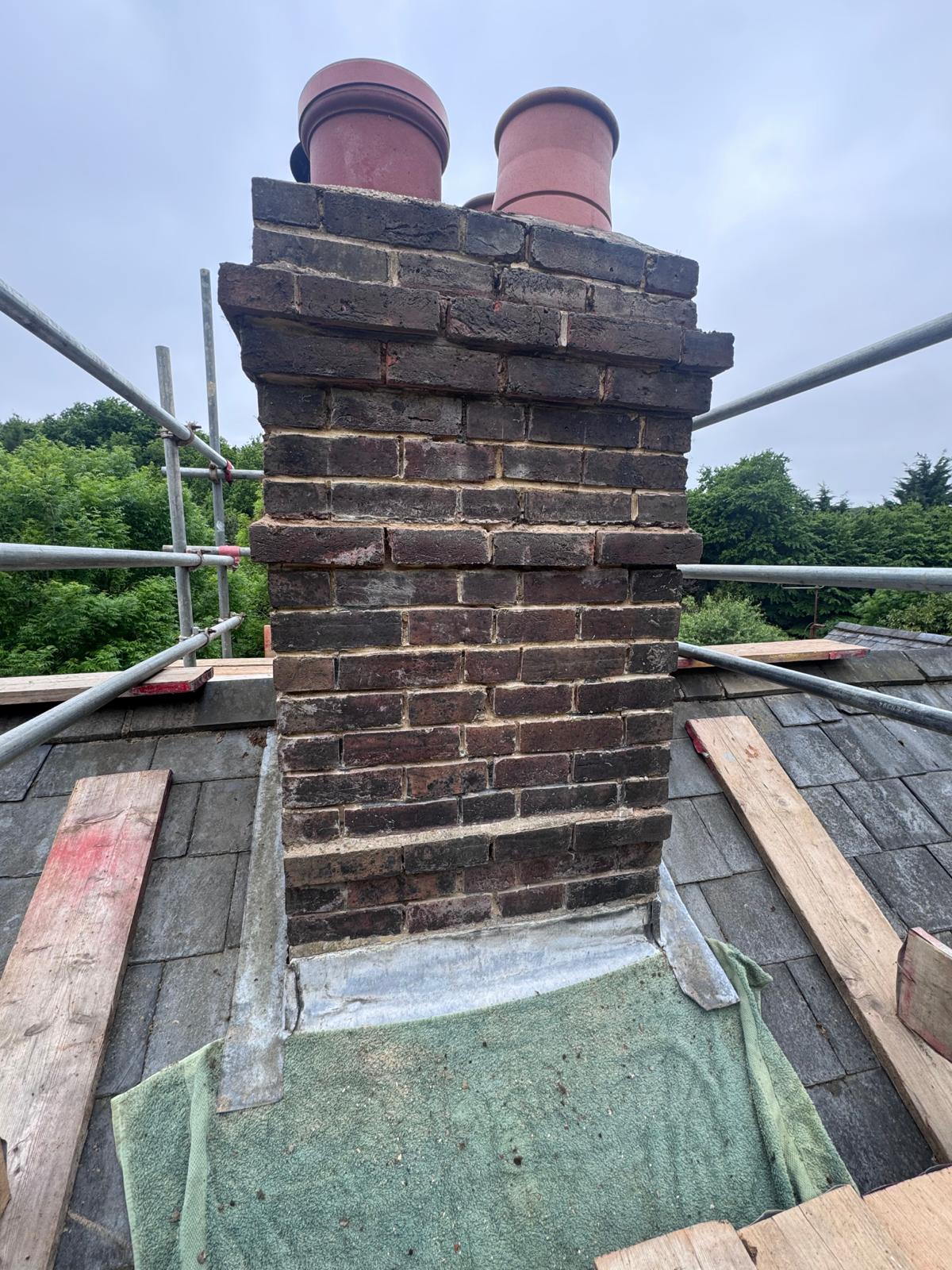 Chimney before repointing, on scaffolding